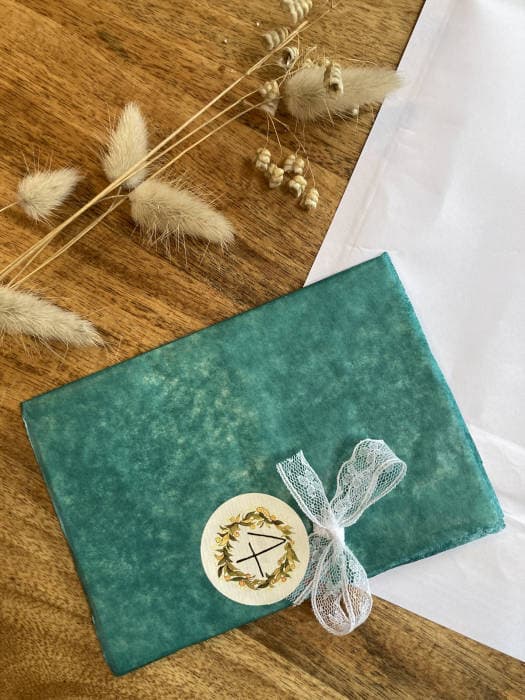 Manon working at her desk